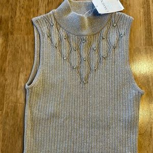 Woman’s Carmen Marc Valvo champagne metallic tank size xs
